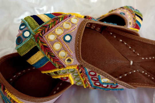 Summer shop embroidered in multi colour thread work with mirrors, very comfortable ladies shoes for all occasions.